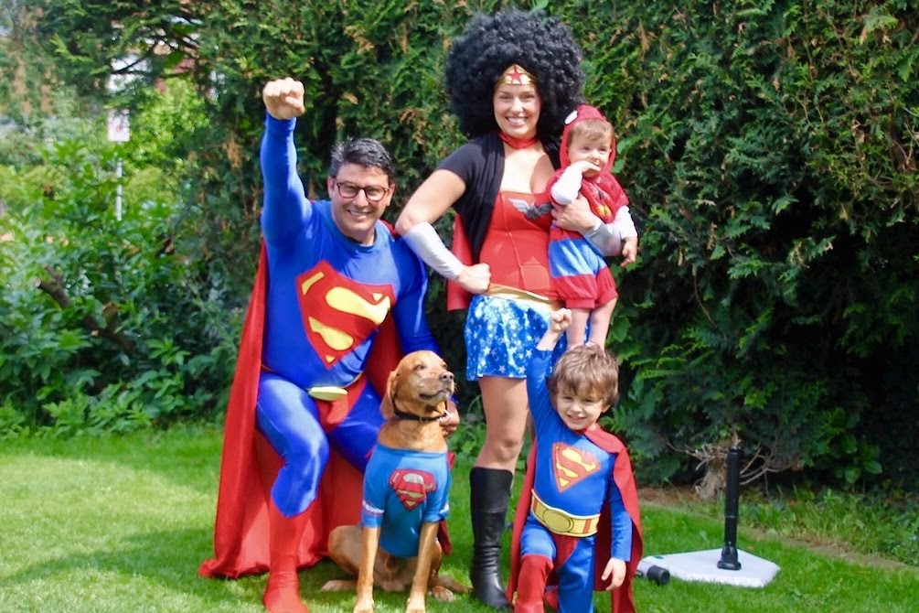 The Ciminiera Family dressed up as superheroes for Nicolas's first birthday party.